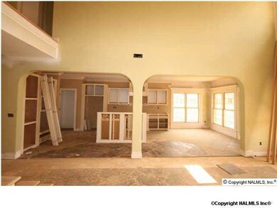 View of Kitchen and Breakfast from the Family Room. This home will have stone column accents.