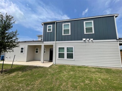 Back of property featuring a patio area, board an