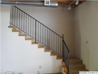 Stairs to Upstairs with Wrought Iron Rail