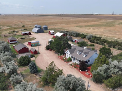 The Legacy Ranch w/multiple outbuildings