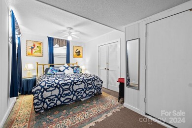 Current owners use the basement as a 4th bedroom option FYI..Double doors in the photo lead to a craft room.