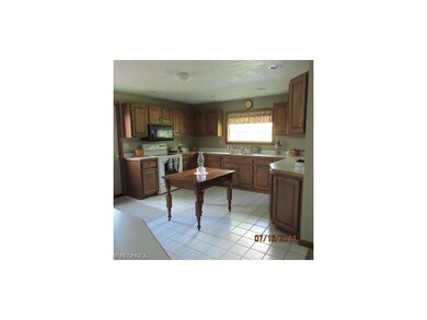 The kitchen is updated and totally lovely.