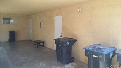 covered patio with access to rear garages