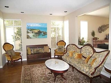 Living room with beautiful hardwood flooring.
