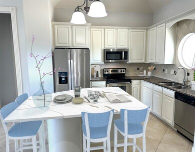 Beautiful kitchen with NEW Quartz island, granite