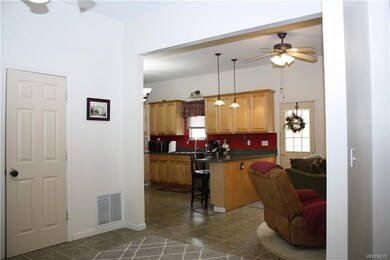 view from front entry to open kitchen / living area
