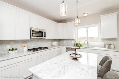 G.E Stainless Steel Appliances. Microwave vents outside:)
