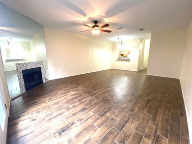 Large open living/dining area features updated woo