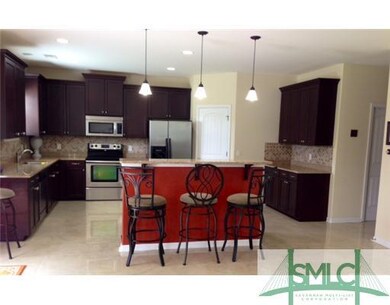Kitchen. Granite countertops also on the island, l