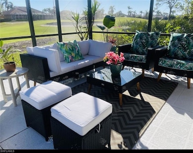 Sunroom featuring an outdoor living space