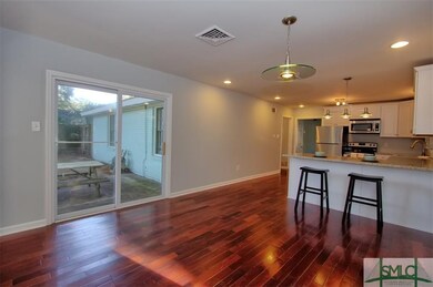 New sliding glass doors expand entertaining space 