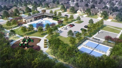 Aerial view of residential area featuring a pool