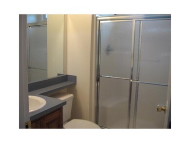 Full Bath. Main Full Bath with seat in shower.
