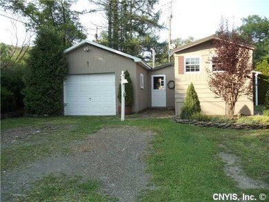 Exterior Front. Garage attached via Breezeway.