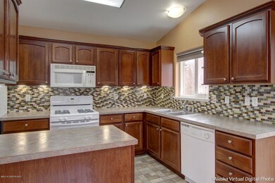 Kitchen with Tiled Backsplash