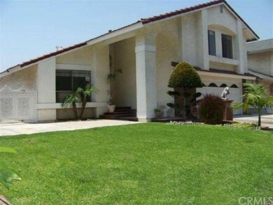 Front exterior with beautiful landscaping