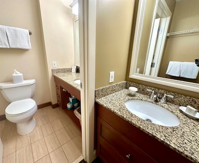 Two bathrooms with outer sink area