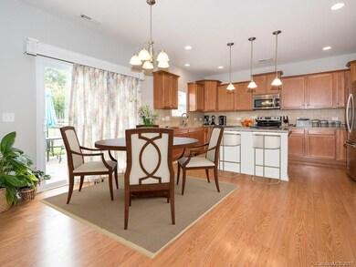 Virtual Staging with dining table and bar stools,