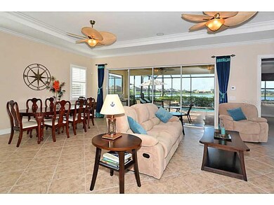 Great Room - Your dream layout takes brings the outdoors in to you with sliding panel doors. This San Remo great room plan features surround sound, plantation shutters, tray ceilings, crown molding & upgraded tile flooring on the diagonal to draw the eye.