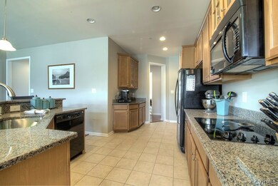 View of kitchen from breakfast nook.  Butler's pantry area at far end.