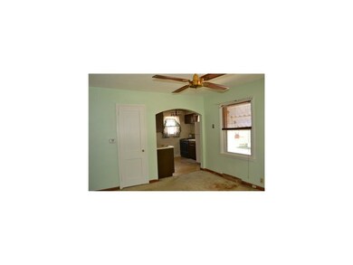 Living Room. Hardwood floors under carpet.