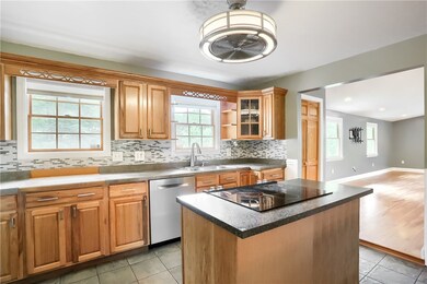 Sun filled windows flood the space with natural li