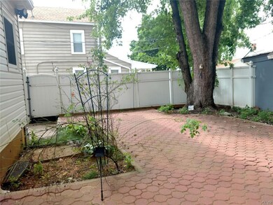 Privacy fencing surrounds the yard