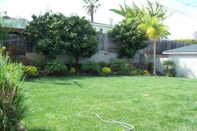 Beautifully landscaped and spacious backyard.  Amp