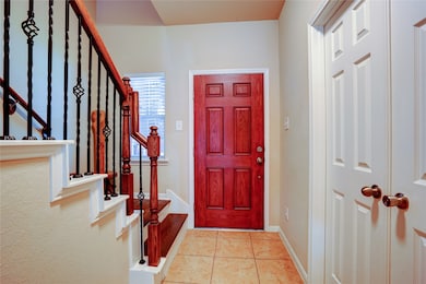 Welcome Home! Notice the hardwood stairs and wrought iron spindles on the staircase!
