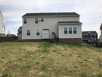 137 Saddle Ridge Drive.   Rear view of the home.