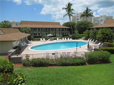 Front balcony view of pool and clubhouse