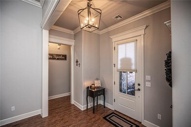 Once inside you fill find an open floor plan with gorgeous wood flooring, designer colors & extension woodwork through-out.