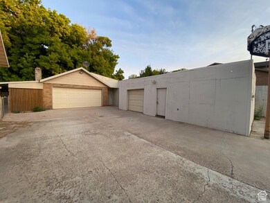 Garage with concrete driveway