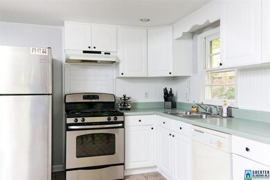 Sellers have refaced the kitchen cabinets, new har