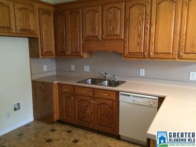 PLENTY OF OAK CABINETS