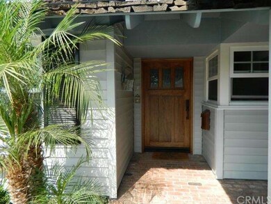 Front entry is pleasant with enough space to set a