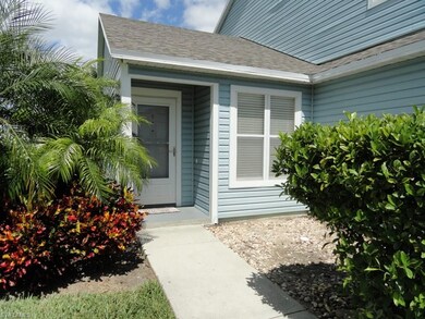 Covered Entry with White Storm Screen Door