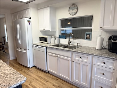 5513 Sir Walters Way, North Fort Myers, FL 33917 - photo 2