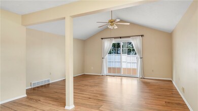 Sliders lead out to a 488 SF deck
