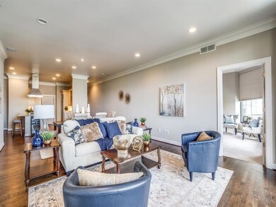 Stacked living and dining with guest suite to the 
