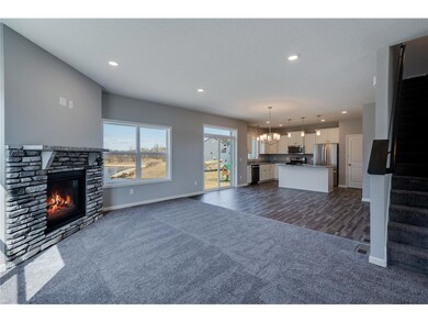 Beautiful open concept main floor-actual home will have Luxury Vinyl Plank Flooring throughout entire main level and fireplace will be in slightly different location.