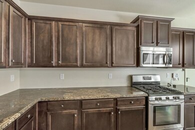 UPGRADED CABINETS AND STAINLESS APPLIANC