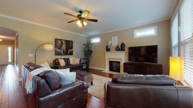 Enjoy a movie as you cuddle in your  den with the warmth of the gas fireplace