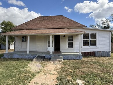 View of front facade featuring a porch and a front