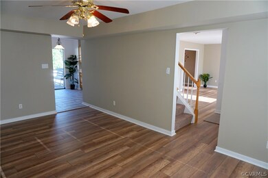 Family Room Opens to Kitchen and Living Room throu