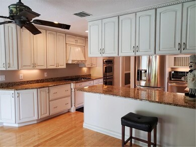 Stunning kitchen including a gas cooktop, double o