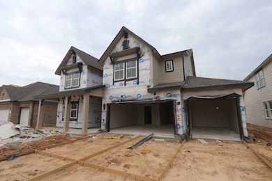 Two story home with 5 bedrooms, 4.5 baths, and 4 c