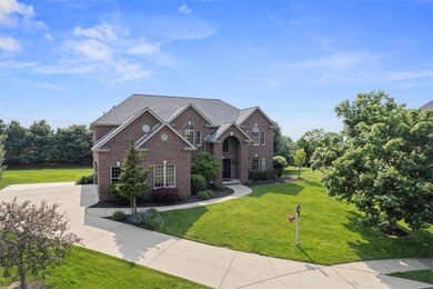 This captivating home offers stunning curb appeal
