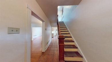 Entry hallway with stairs to 2nd floor