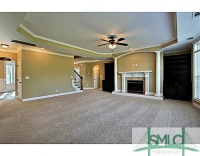 Living Room. Built-ins, columns, and more around t